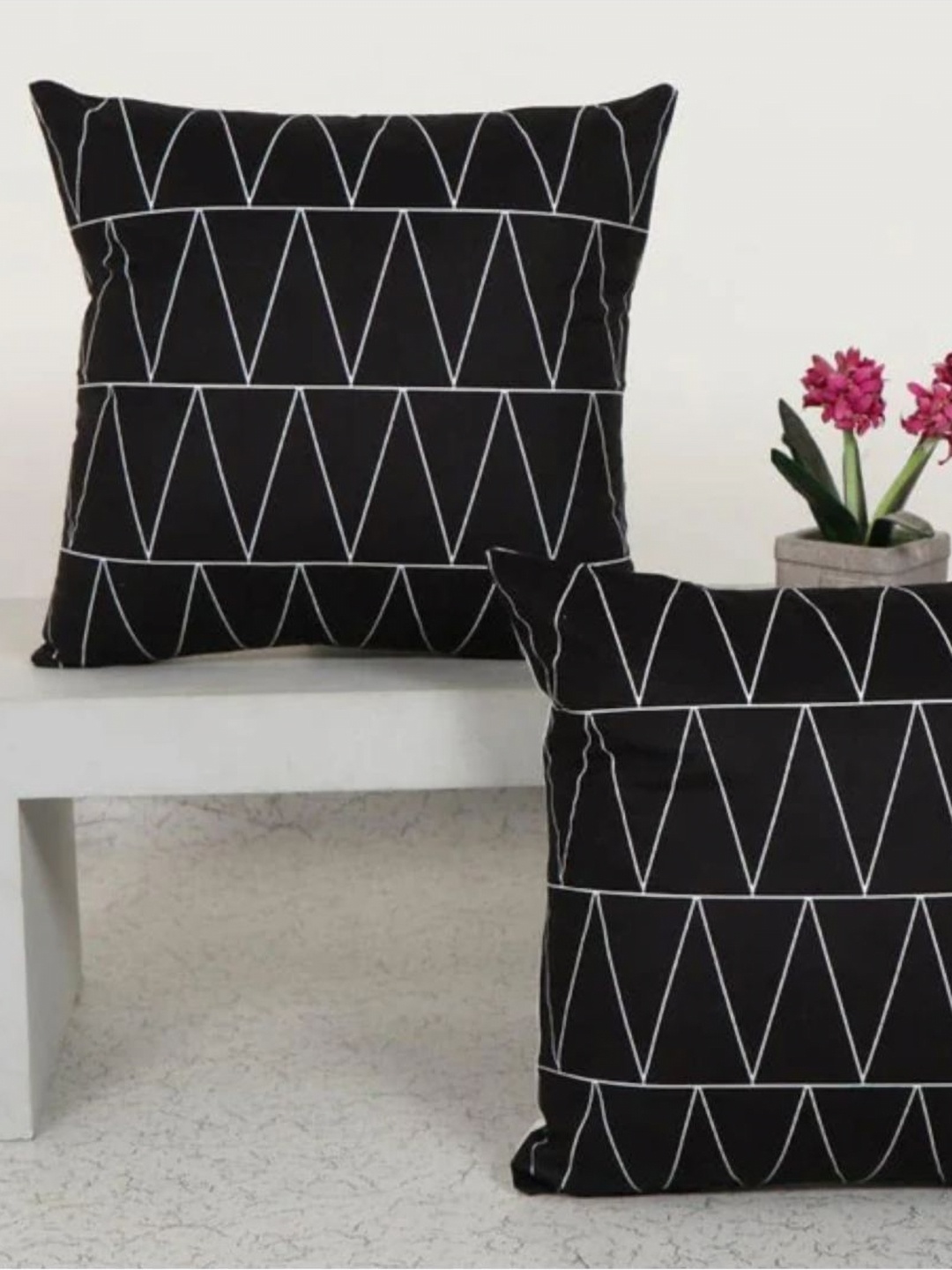 

Aura Black & Off White 2 Pieces Geometric Printed Square Cushion Covers