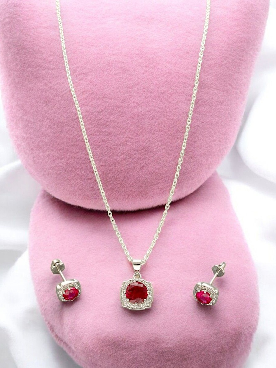 

Sri Jagdamba Pearls Dealer 925 Silver Plated CZ Stone Studded Jewellery Set