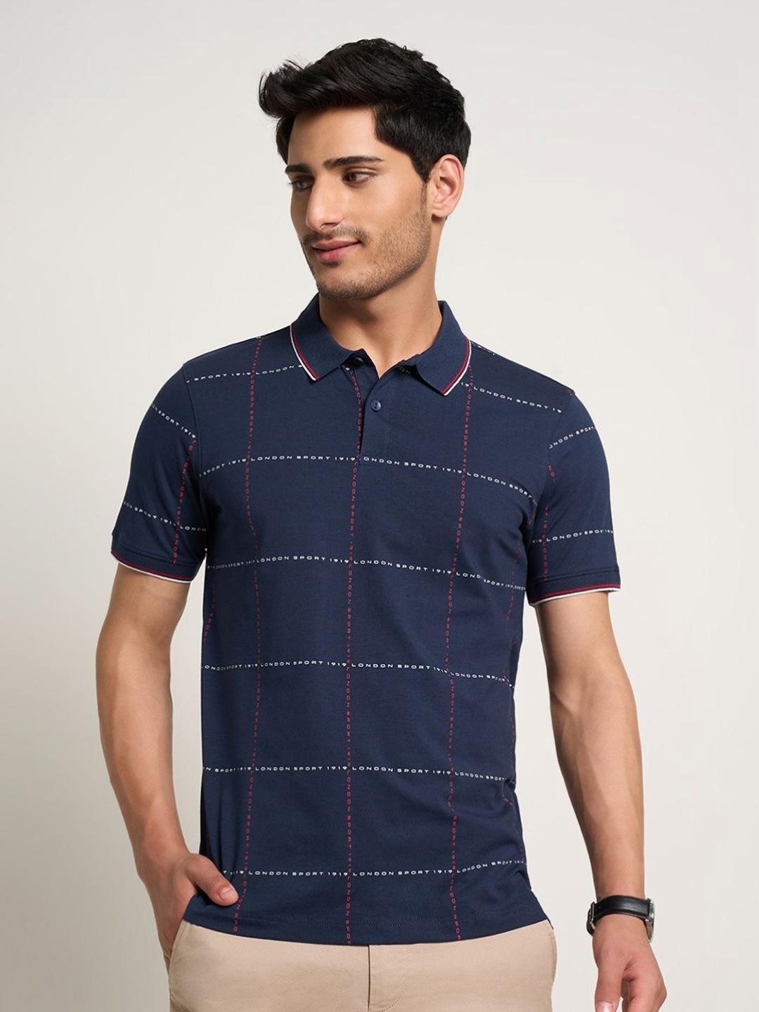 

Peregrine by Pantaloons Men Typography Printed Polo Collar Cotton Slim Fit T-shirt, Teal