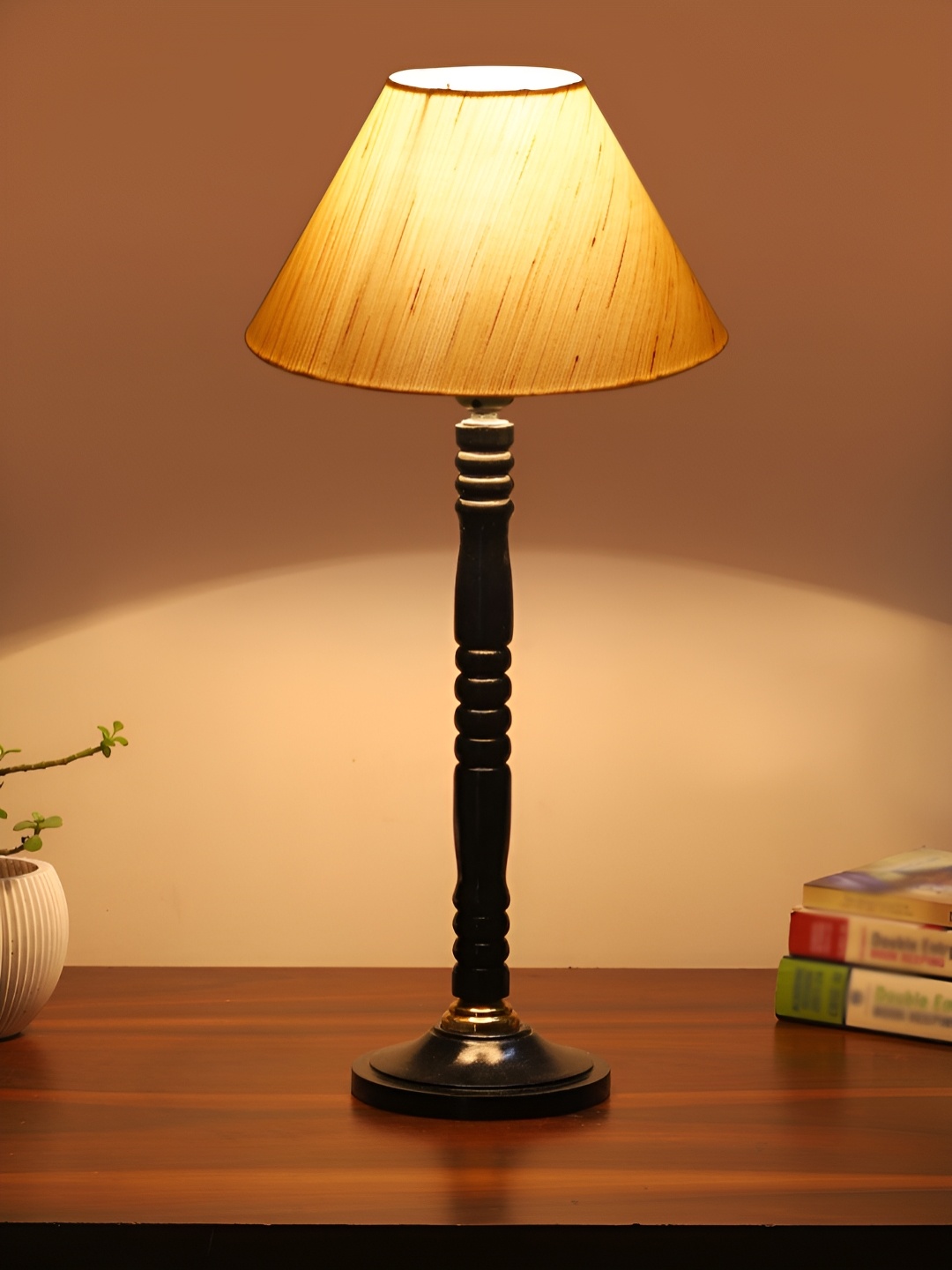 

Devansh Off White Textured Wooden Frusturical Shaped Table Lamp