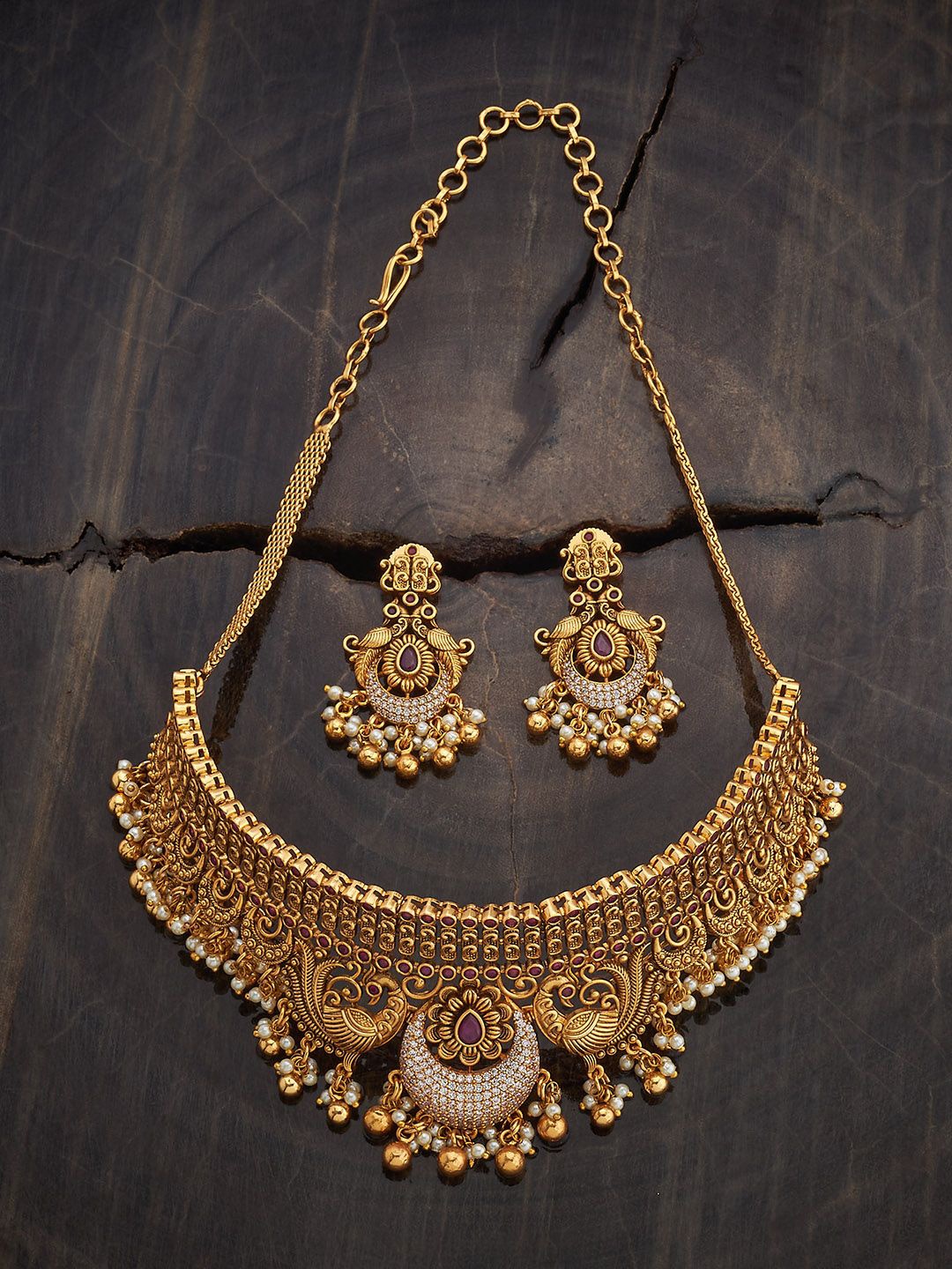 

Kushal's Fashion Jewellery Gold-Plated Stone-Studded & Beaded Antique Jewellery Set