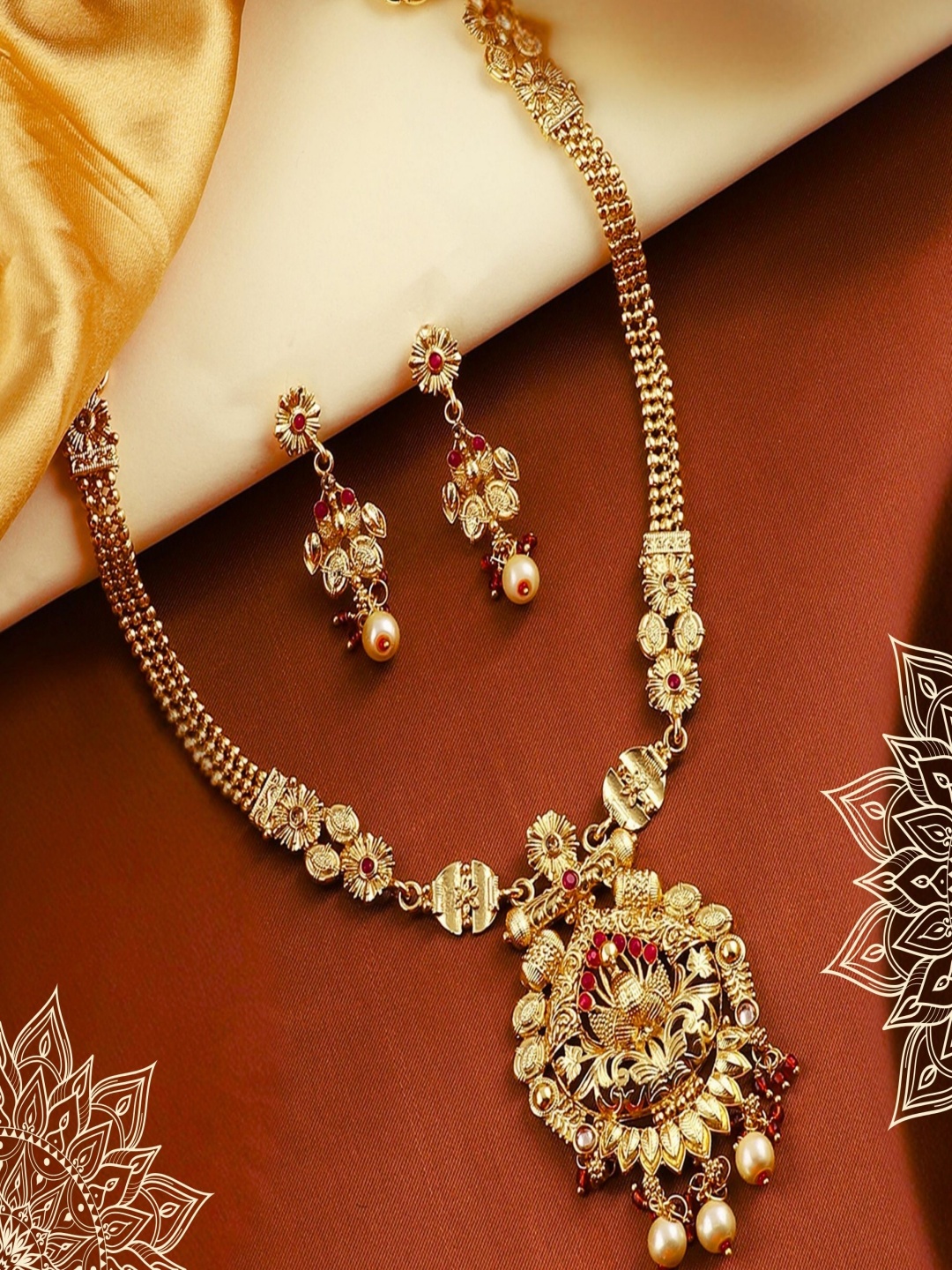 

ORANGENYSHA Gold Plated Kundan Stone Studded & Beaded Jewellery Set