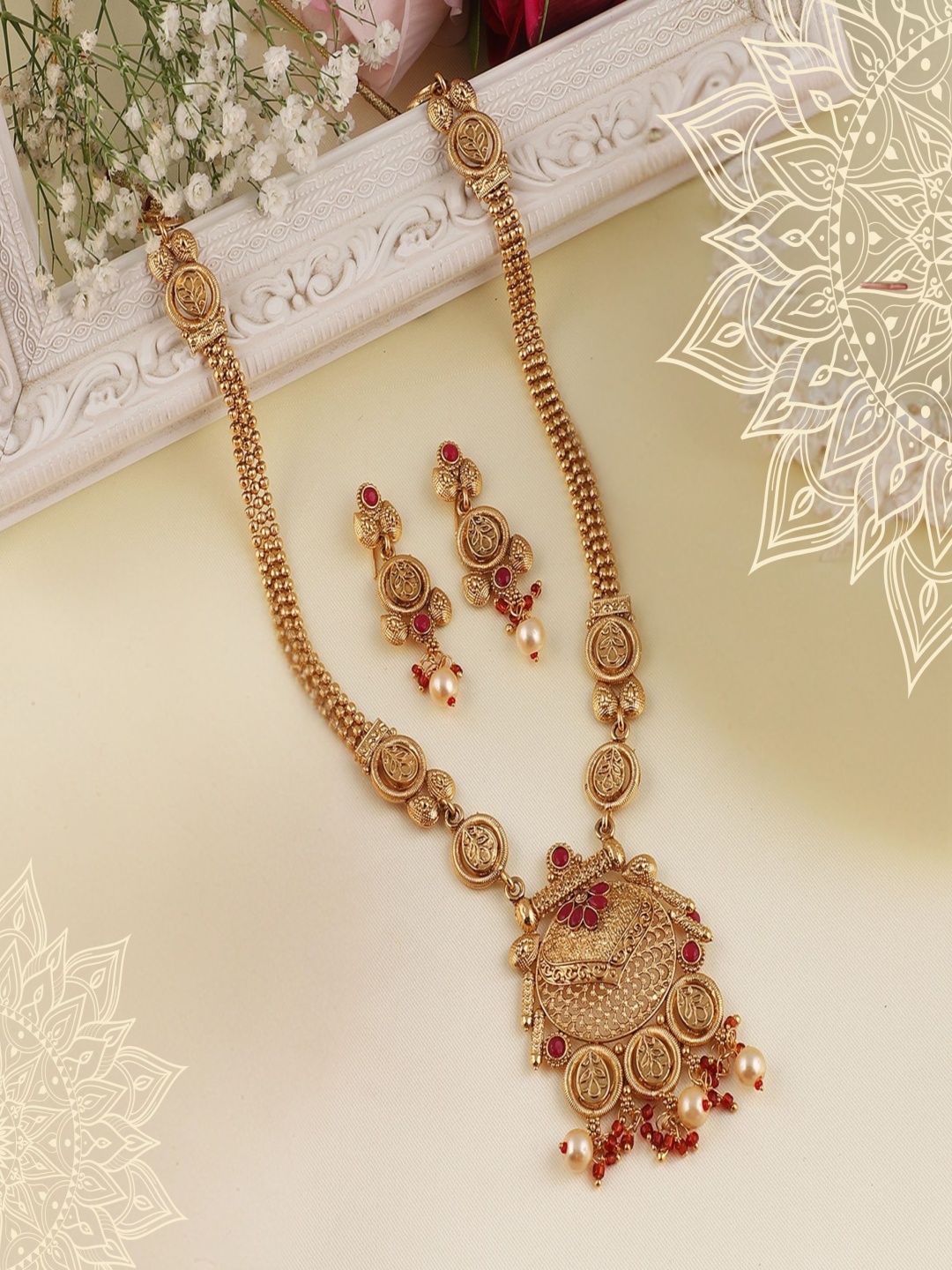 

ORANGENYSHA Gold Plated Kundan Stone Studded & Beaded Jewellery Set