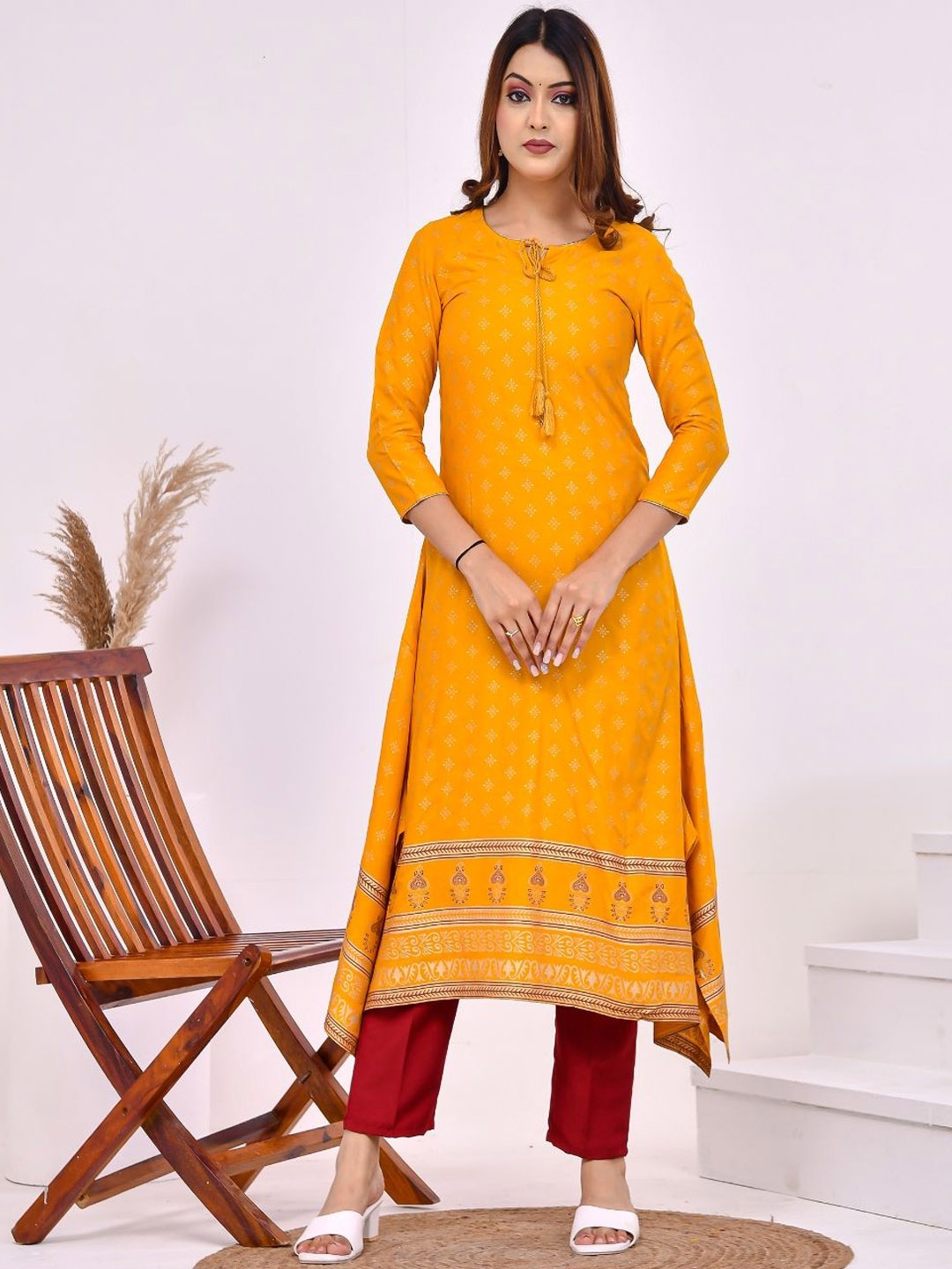 

Aspriya Ethnic Motifs Printed Tie-Up Neck Kurta, Yellow