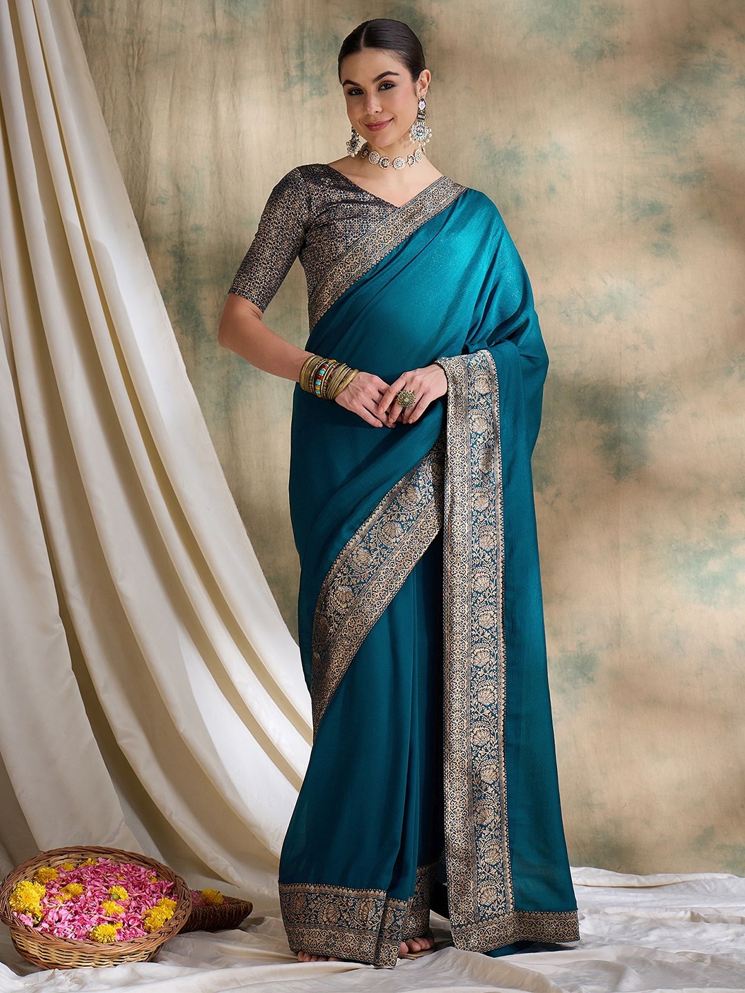 

DEVATITHI Women Ethnic Motifs Zari Saree, Teal