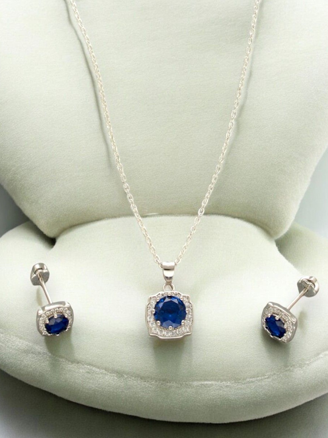 

Sri Jagdamba Pearls Dealer 925 Silver Plated CZ Stone Studded Jewellery Set