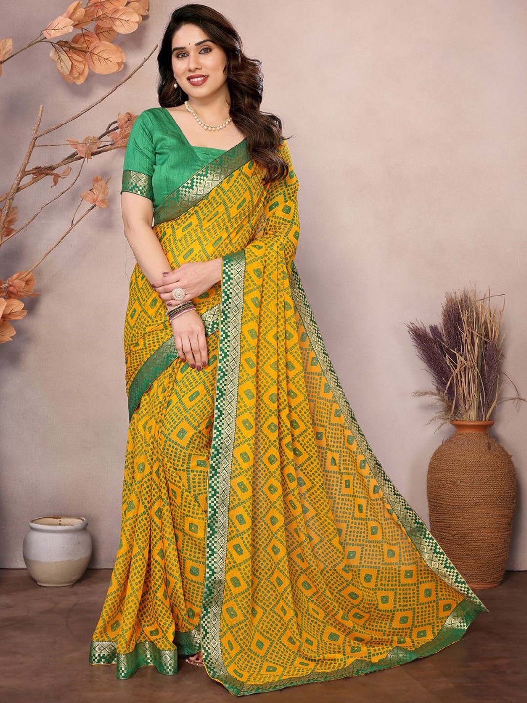 

KALINI Ethnic Motifs Zari Poly Georgette Bandhani Saree, Yellow