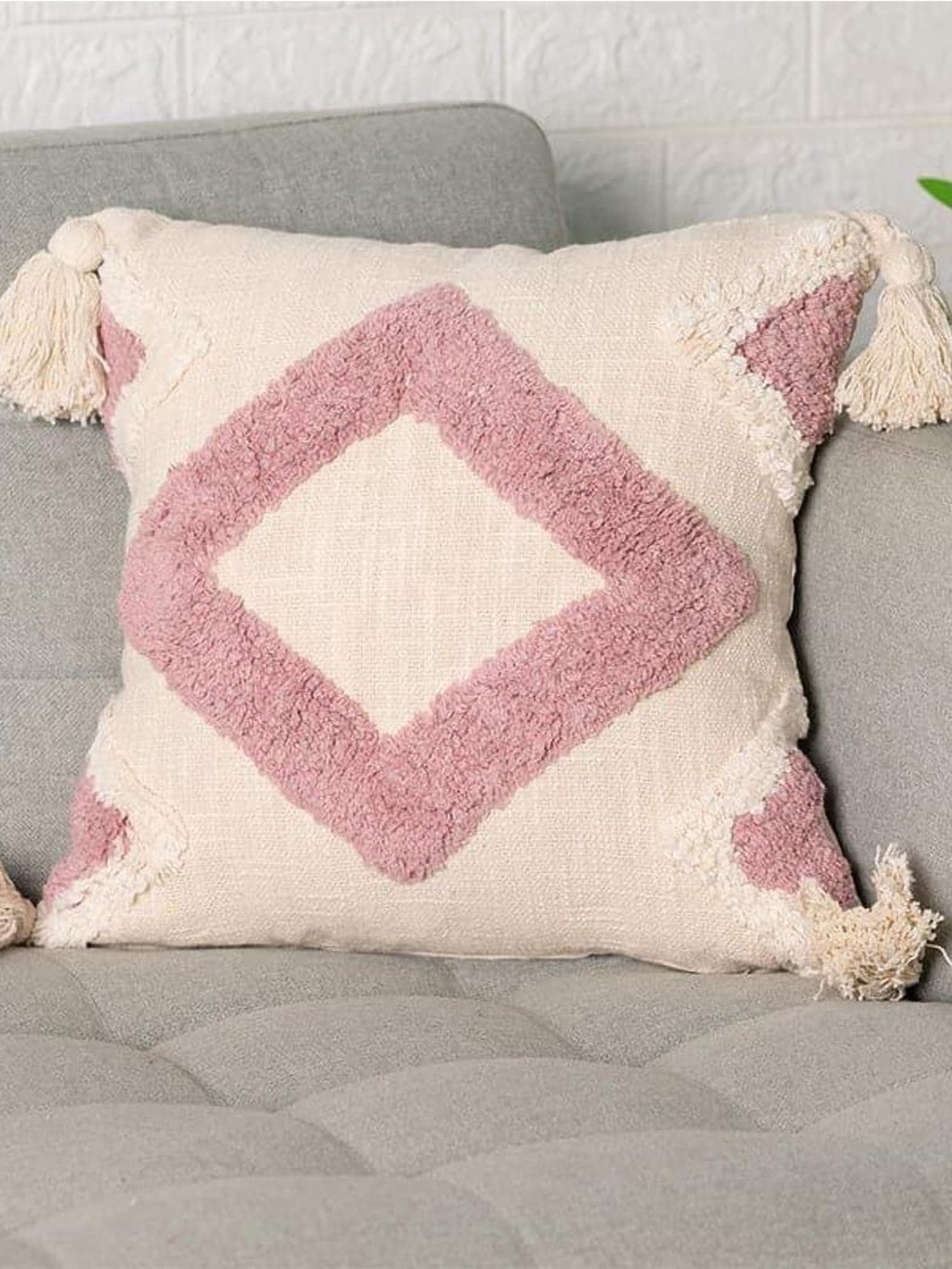 

Aura Peach And Pink Self Design Square Cushion Covers