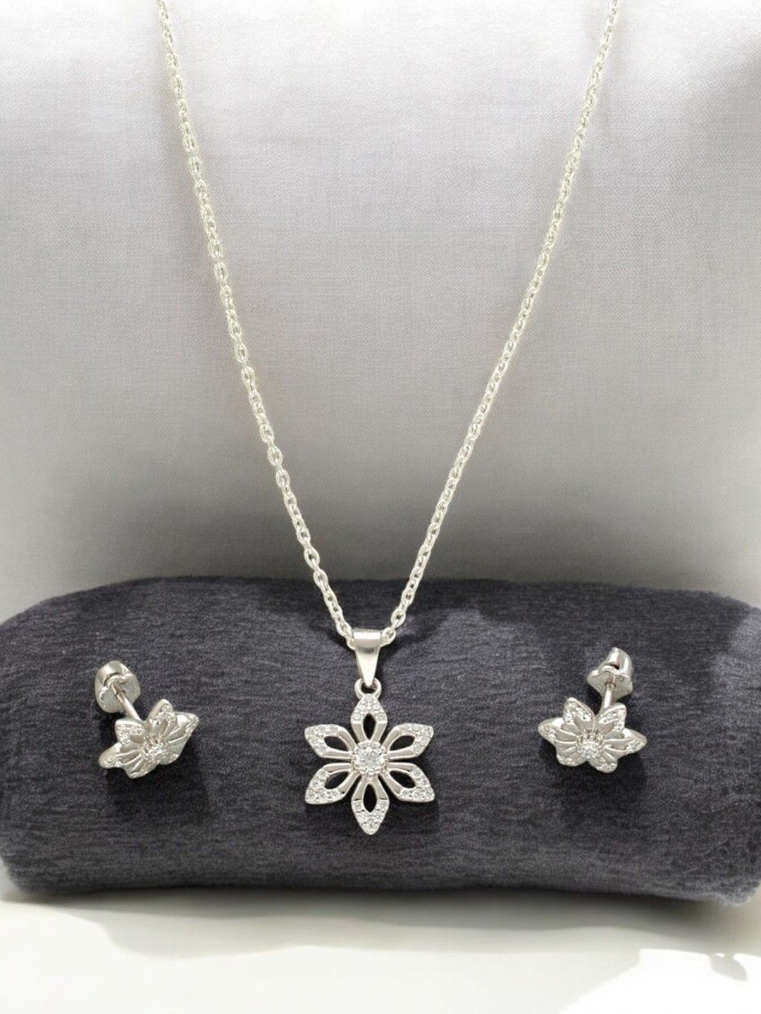 

Sri Jagdamba Pearls Dealer 925 Silver Plated CZ Stone Studded Jewellery Set