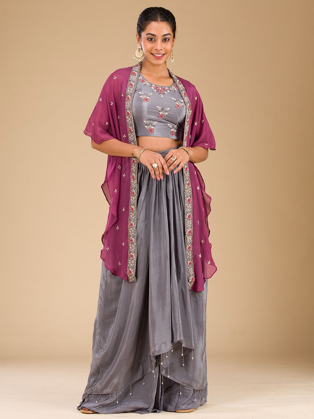 

Koskii Grey Cutdana Georgette Readymade Crop Top With Skirt & Cape Co-Ords