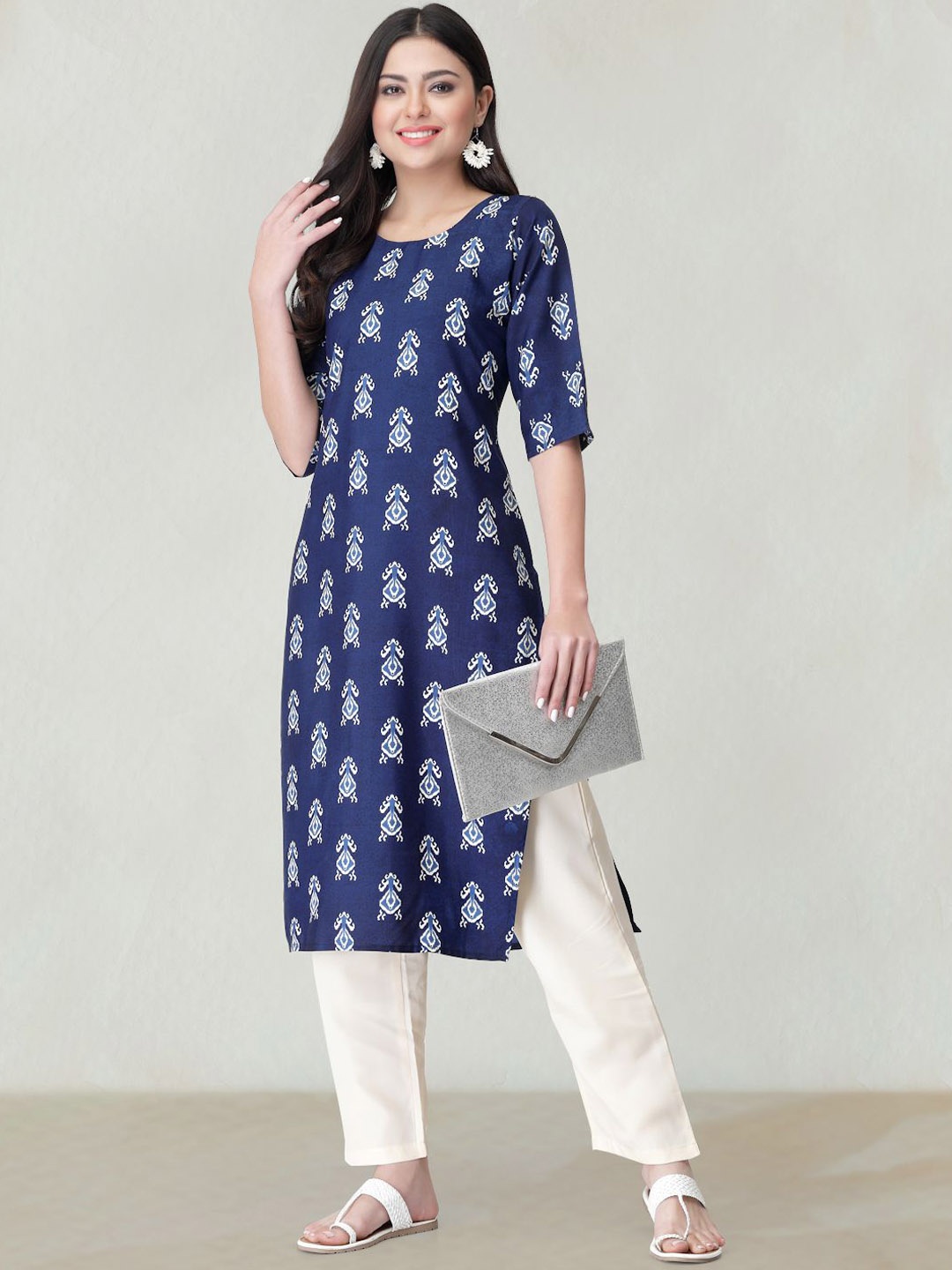 

Moda Rapido Women Ethnic Motifs Printed Sequinned Floral Crepe Kurta, Blue