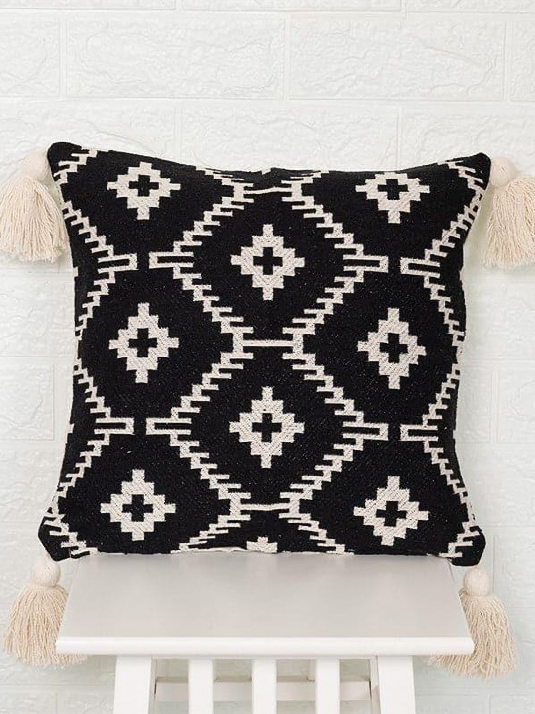 

Aura Cream And Black Geometric Woven Design Square Shaped Cotton Cushion Covers