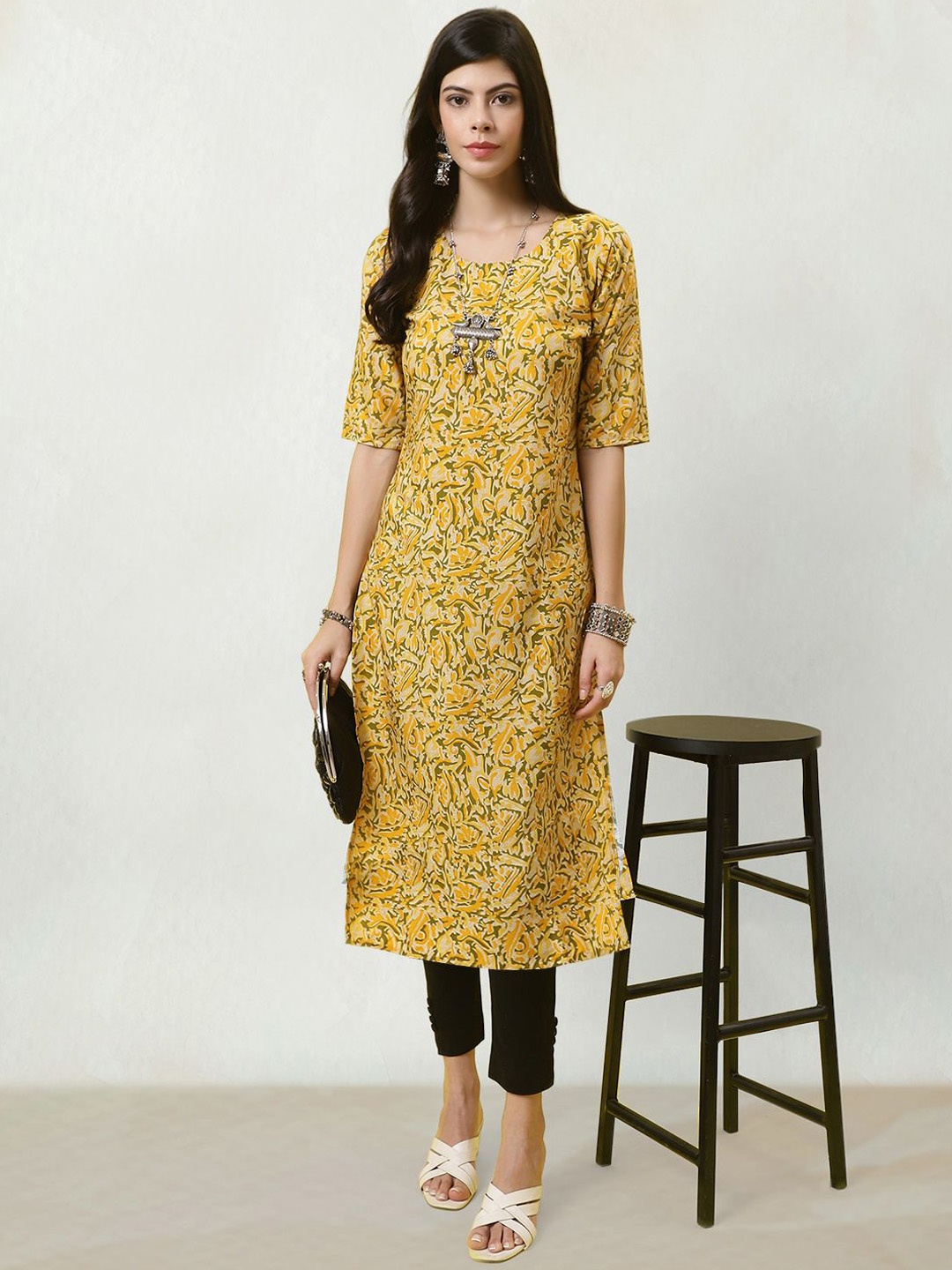 

Moda Rapido Women Ethnic Motifs Printed Mirror Work Floral Crepe Kurta, Yellow