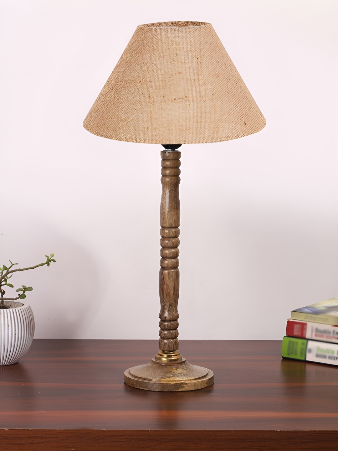 

Devansh Beige Textured Wooden Frusturical Shaped Table Lamp