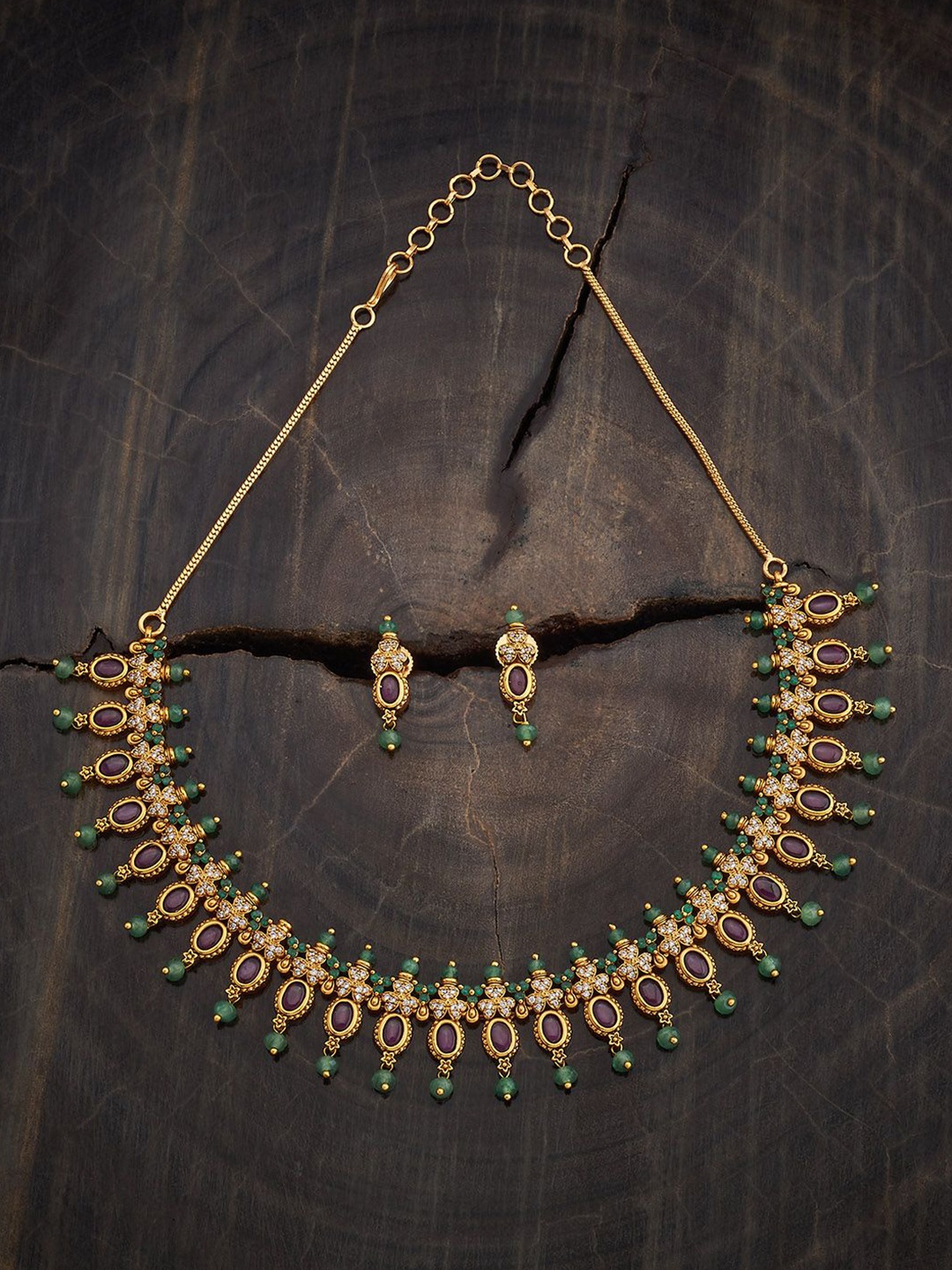 

Kushal's Fashion Jewellery Gold-Plated Stone-Studded Antique Jewellery Set