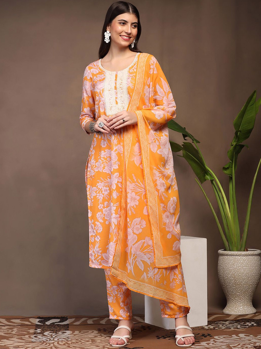 

Moda Rapido Women Floral Printed Regular Kurta with Trousers & With Dupatta, Orange