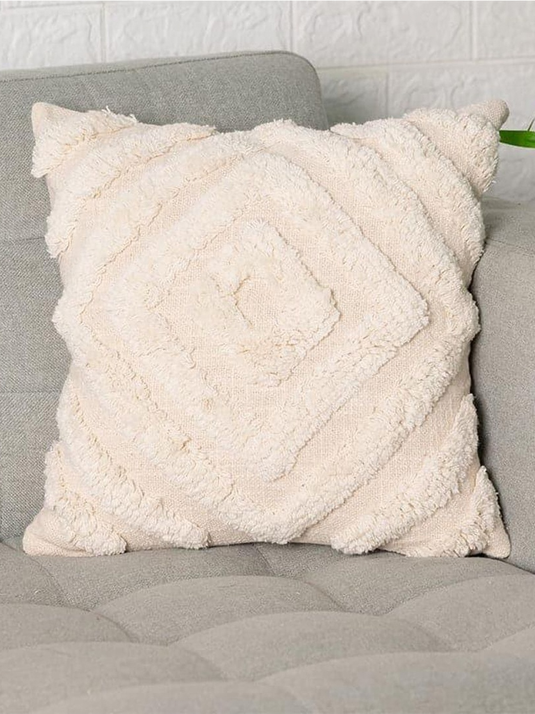 

Aura Cream Self Design Textured Square Shaped Cotton Cushion Covers