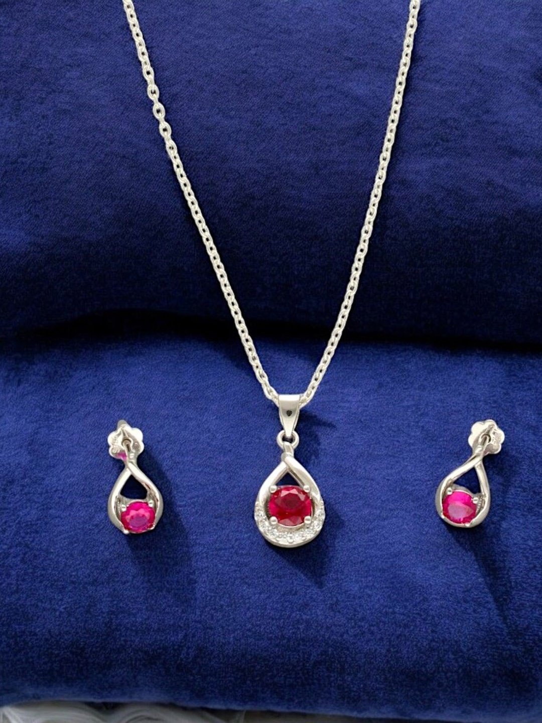 

Sri Jagdamba Pearls Dealer 925 Silver Plated CZ Stone Studded Jewellery Set
