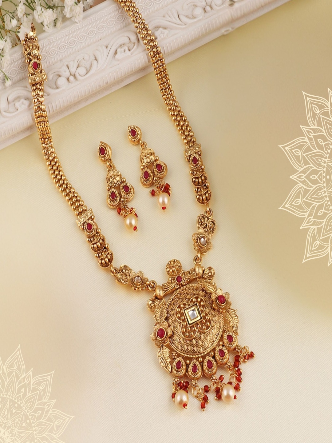 

ORANGENYSHA Gold Plated Kundan Stone Studded & Beaded Jewellery Set