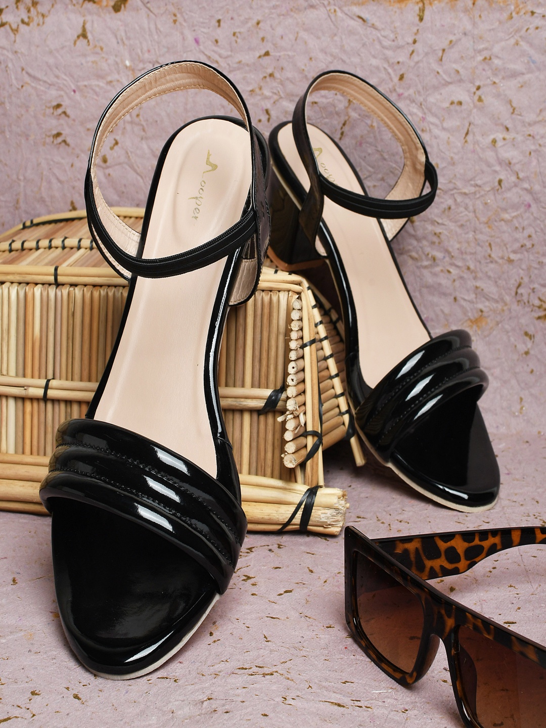 

Looper Women Ankle Strap Padded Heel Sandal, Black