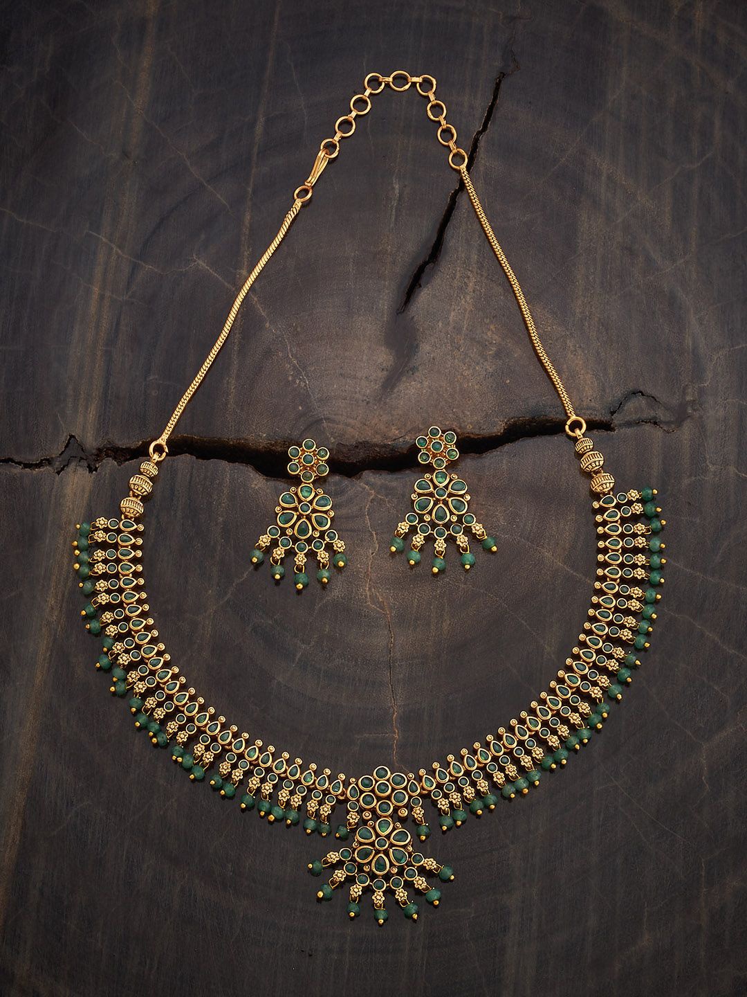 

Kushal's Fashion Jewellery Gold-Plated Stone-Studded Antique Jewellery Set