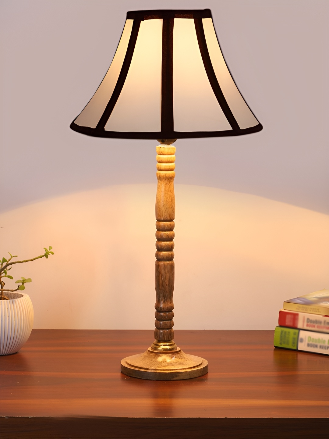 

Devansh Off White & Black Printed Wooden Contemporary Frustum Shaped Table Lamp