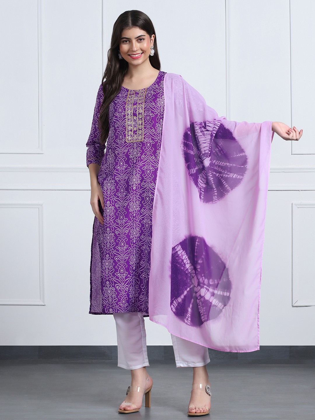 

Moda Rapido Bandhani Printed Round Neck Straight Kurta With Trousers & Dupatta, Purple