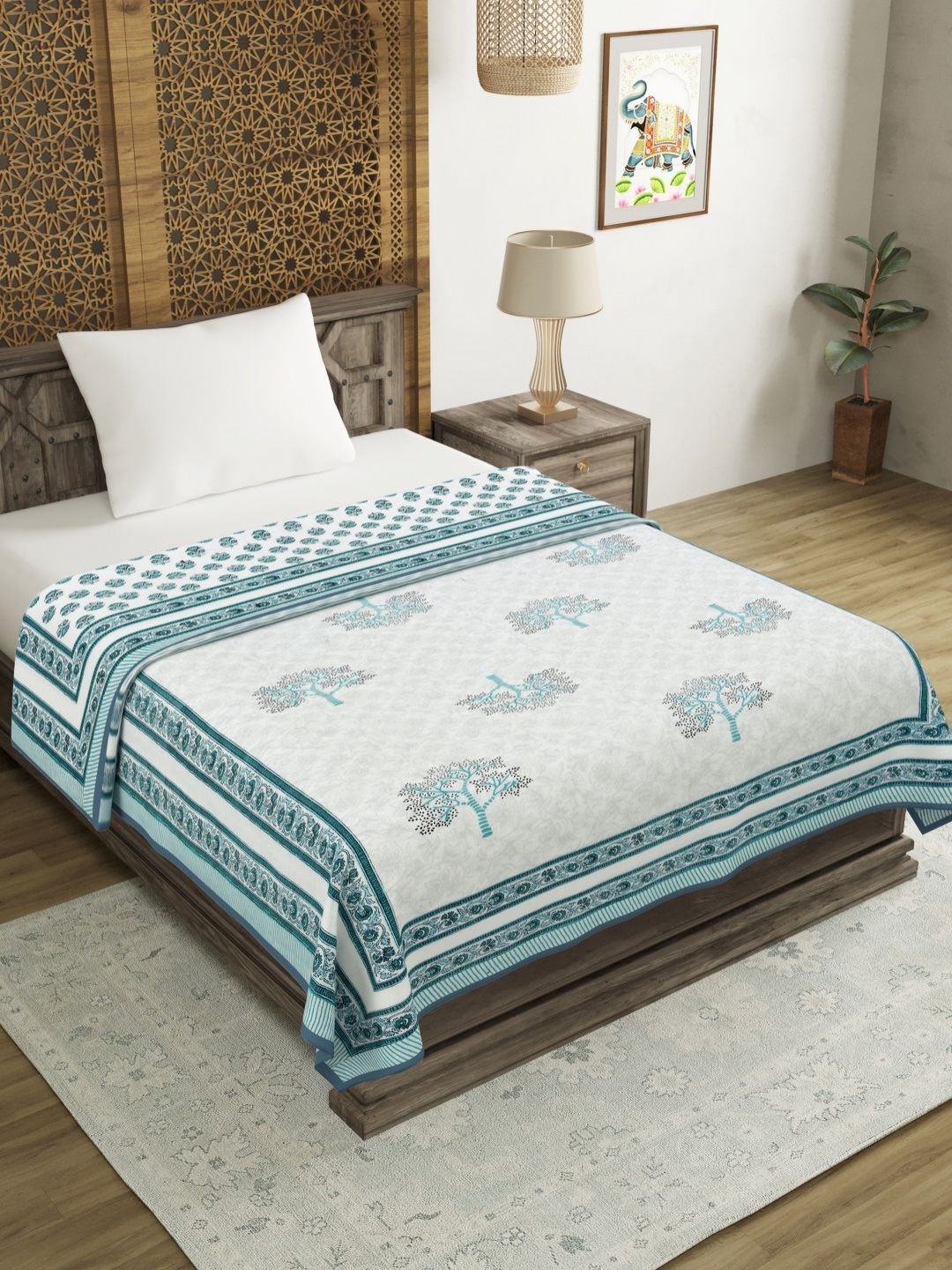 

Myntra Elegant Homes Blue & White Floral Printed Cotton 150 GSM AC Room Single Bed Dohar