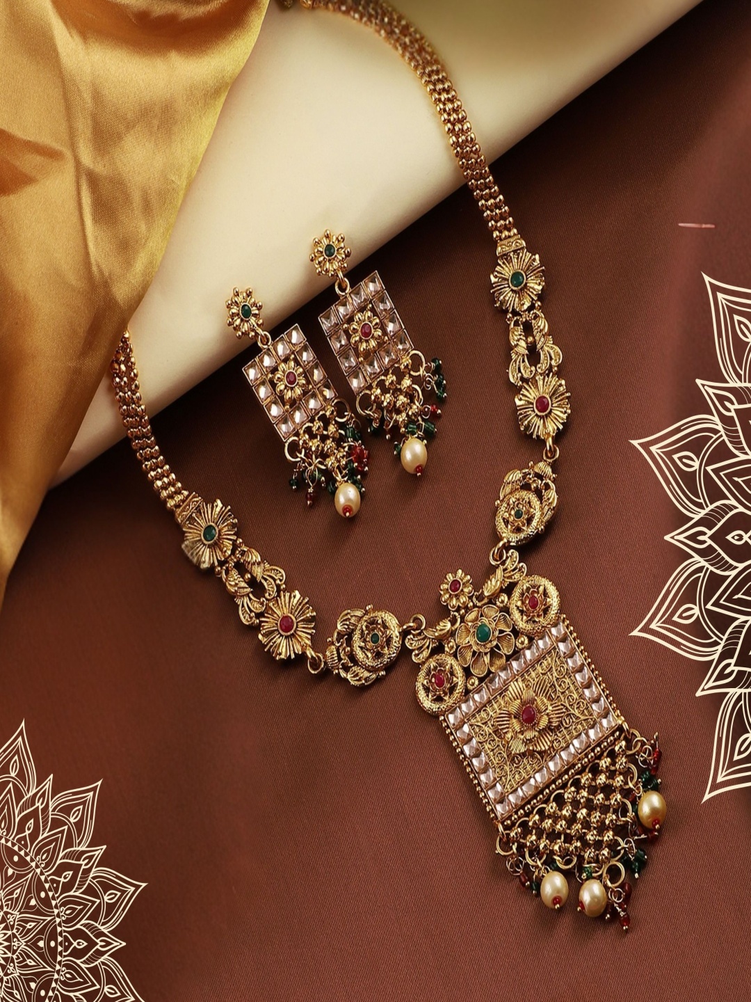 

ORANGENYSHA Gold Plated Kundan Stone Studded & Beaded Jewellery Set