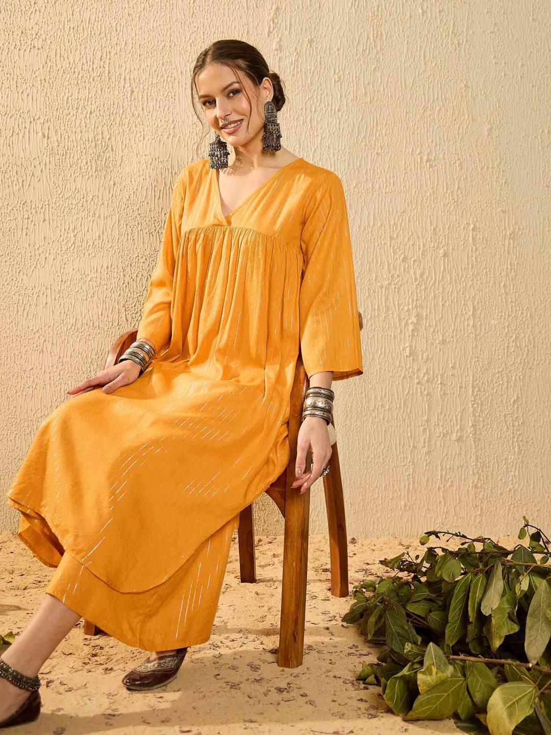 

InWeave Women Embroidered Regular Kurta with Palazzos, Mustard