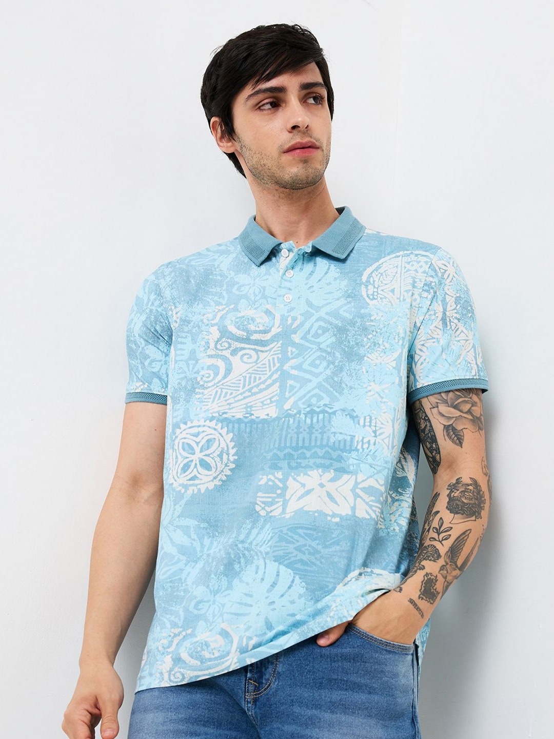 

SPYKAR Men Abstract Printed Polo Collar Cotton Slim Fit T-shirt, Turquoise blue