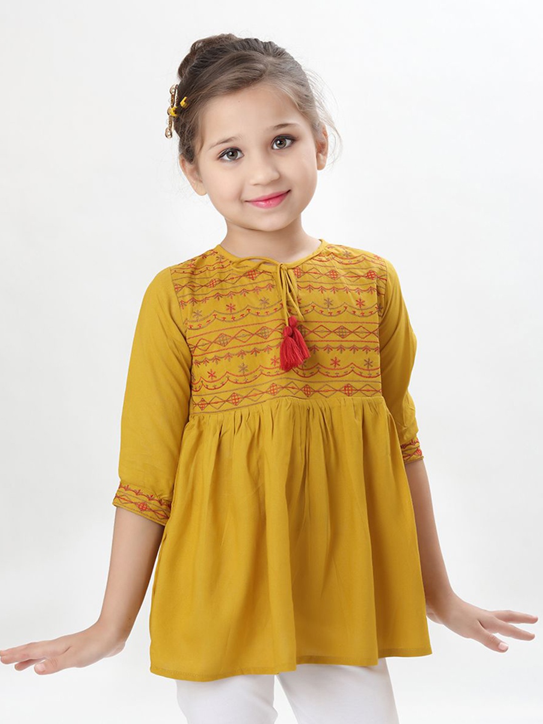 

Ishti Embellished Embroidered Top, Mustard