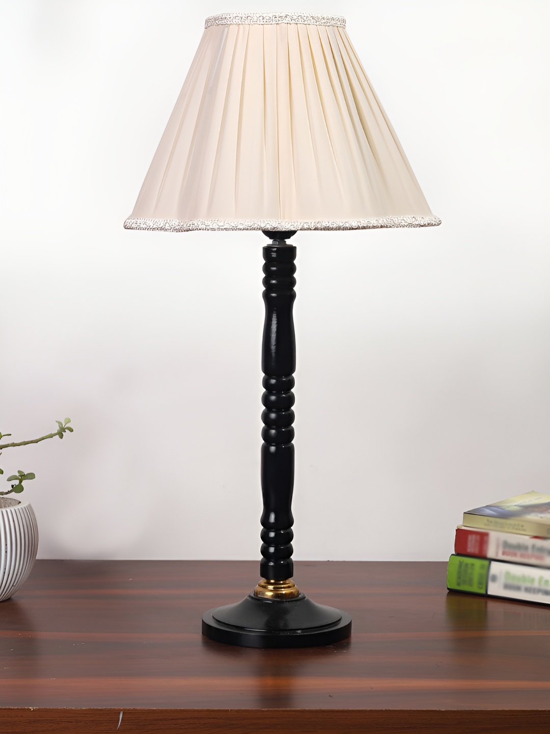 

Devansh Off White & Black Textured Wooden Contemporary Frustum Shaped Table Lamp