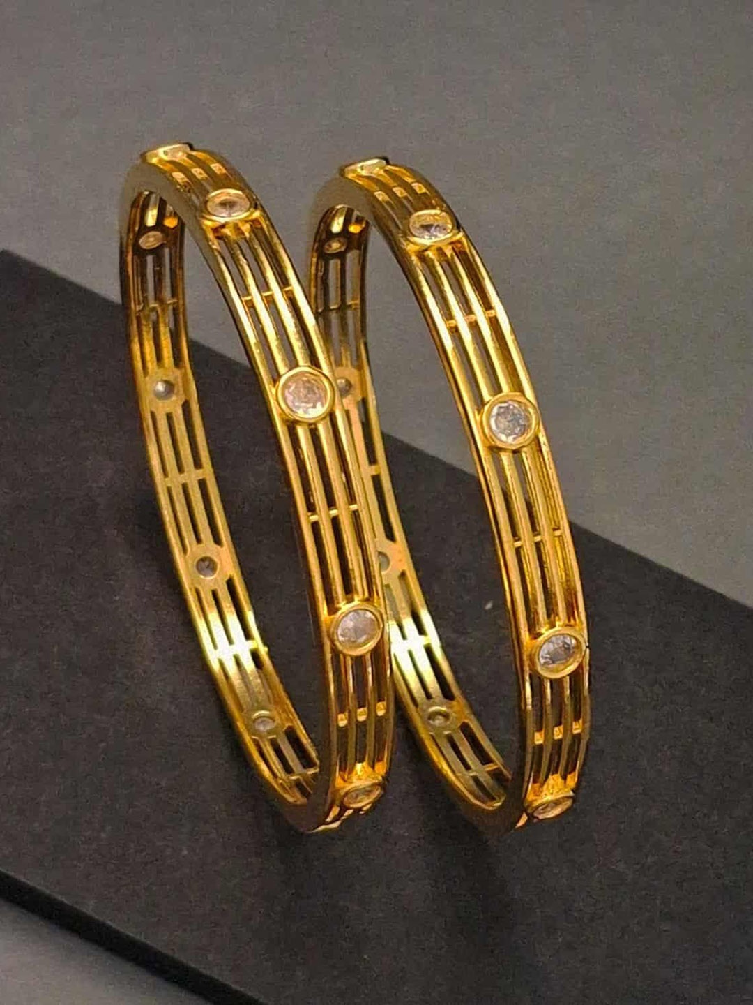 

Zevarly Set Of 2 Gold-Plated American Diamond Stone-Studded Bangles