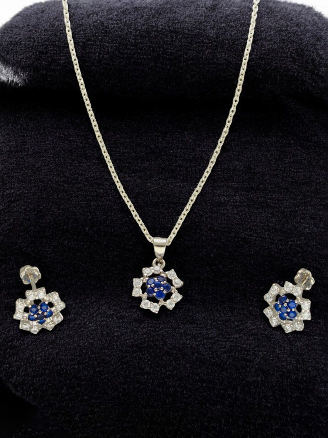 

Sri Jagdamba Pearls Dealer 925 Silver Plated CZ Stone Studded Jewellery Set