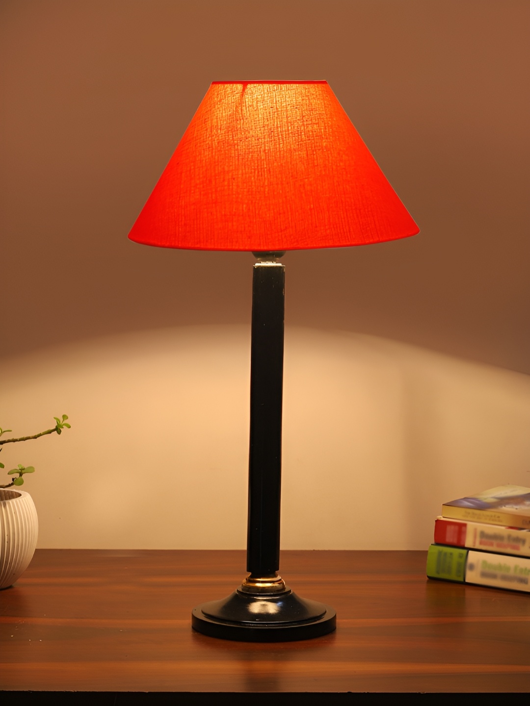 

Devansh Orange Colored & Black Wooden Frustum Shaped Table Lamp