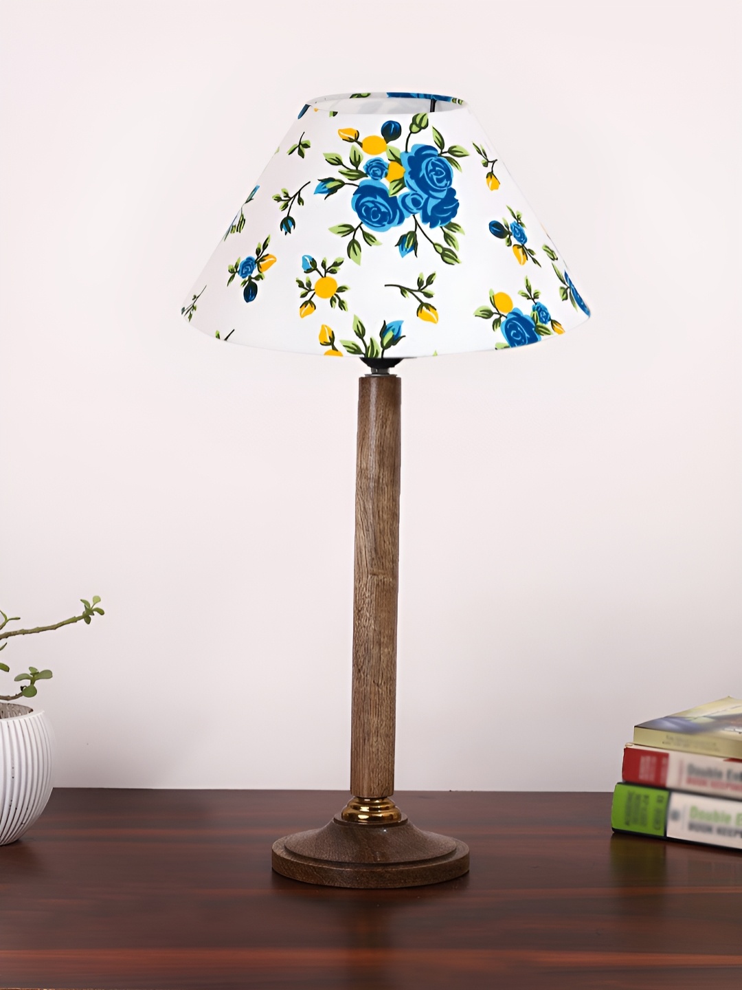 

Devansh White Printed Wooden Frusturical Shaped Table Lamp