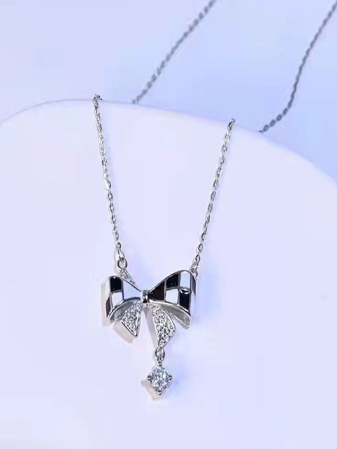 

StyleCast Elegant Silver-Toned Minimal Stone Studded Bow Knot Shaped Chain