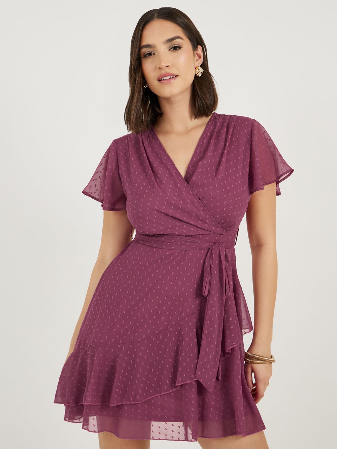 

Styli Women V-Neck Wrap Mini Dress with Flutter Sleeves and Asymmetric Hem, Purple
