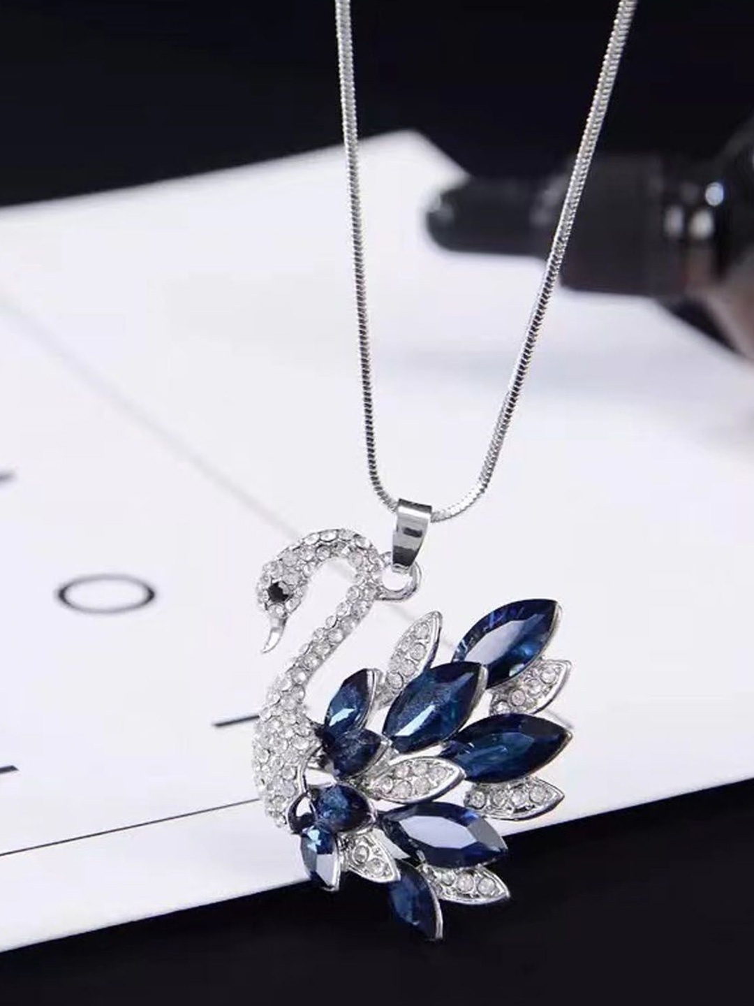 

StyleCast Elegant Silver-Toned Stone Studded Swan Shaped Pendant With Chain