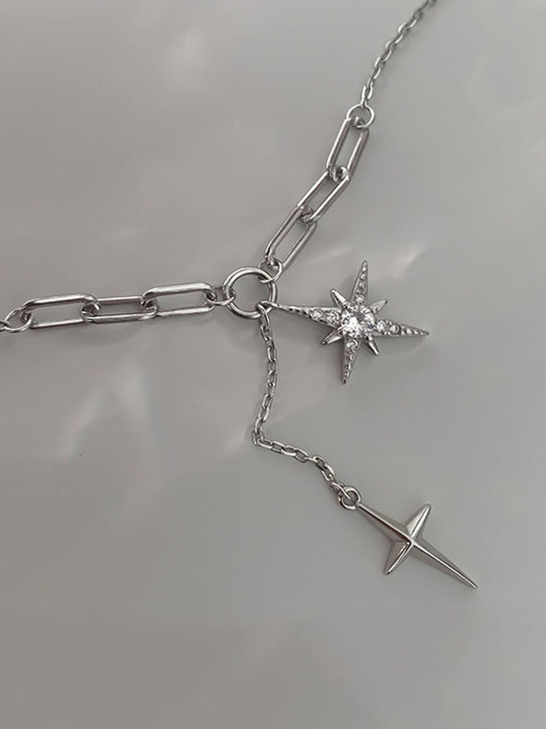 

StyleCast Silver-Toned & White Elegant Stone Studded Minimal Necklace