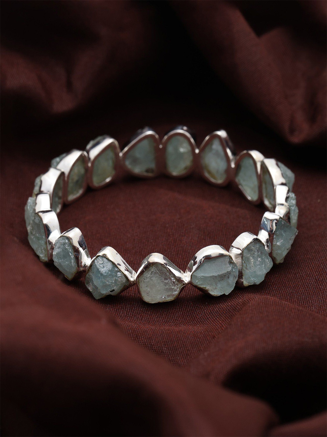 

Exotic India Sterling Silver Rugged Aqua Gemstone Aquamarine Bangle