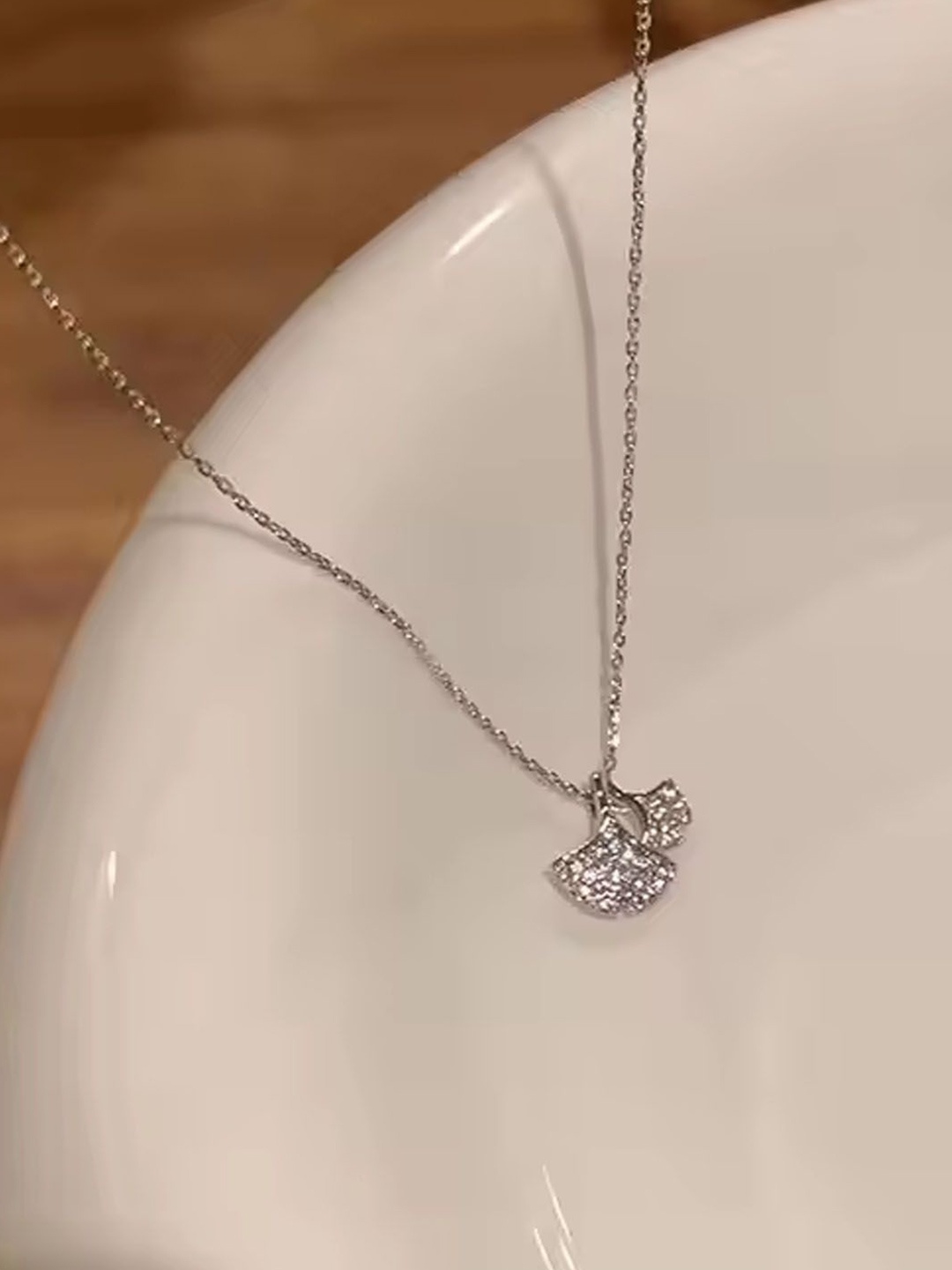 

StyleCast Silver-Toned & White Elegant Stone Studded Minimal Chain
