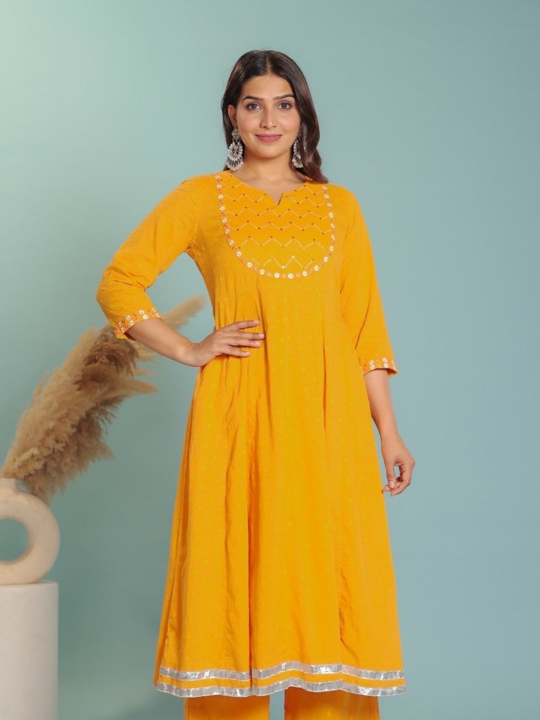 

Aramya Thread Work A Line Notch Neck Kurta, Yellow