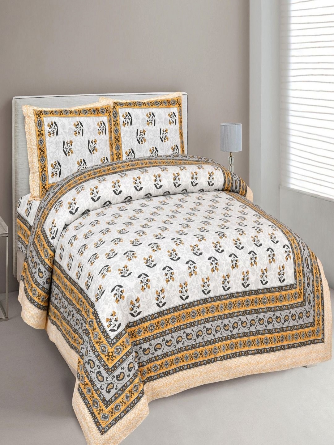 

Myntra Elegant Homes Yellow & White Printed Cotton 180 TC King Bedsheet Set 2.74 m x 2.54m