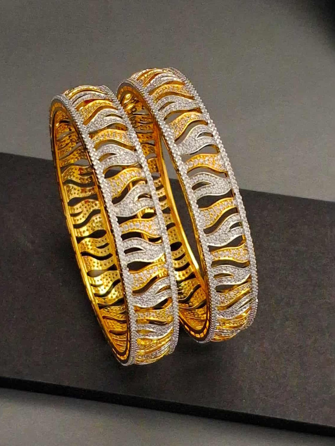 

Zevarly Pack of 2 Gold Plated American Diamond Studded Bangles