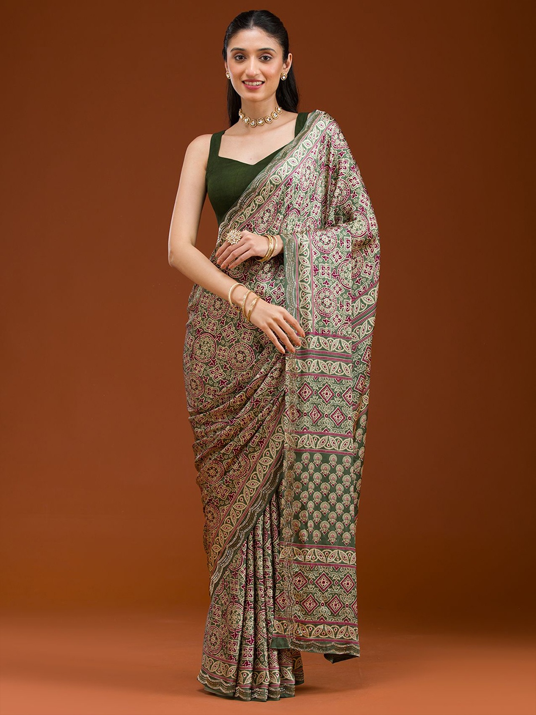 

Koskii Green Printed Satin Saree