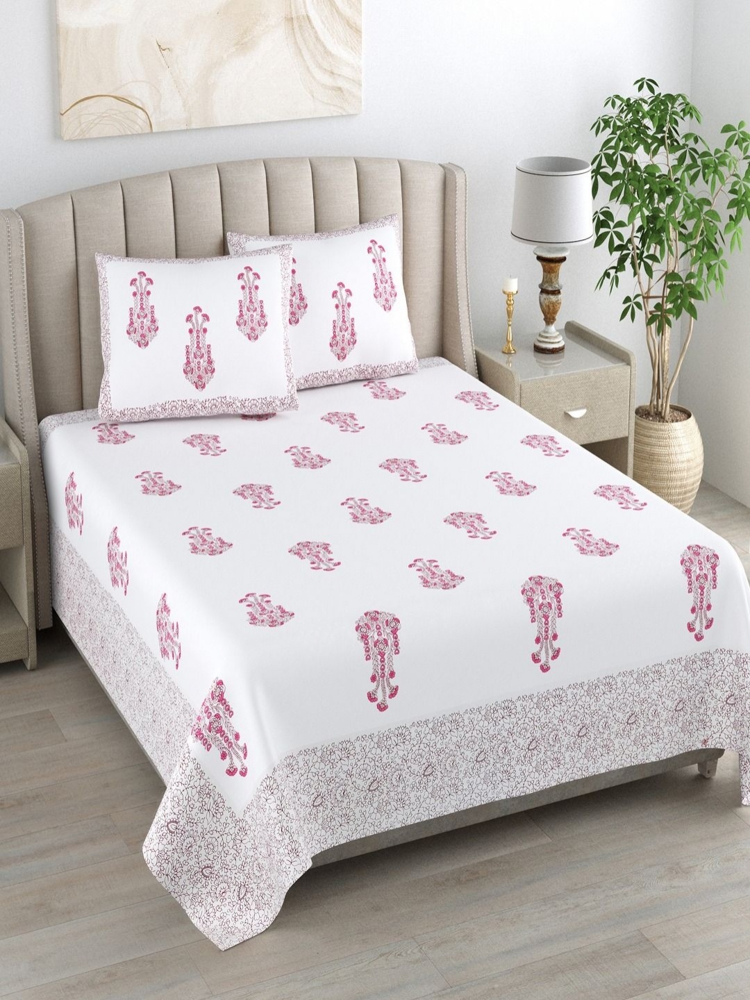 

Myntra Elegant Homes White & Pink Printed Cotton 180 TC King Bedsheet Set 2.74 m x 2.54m