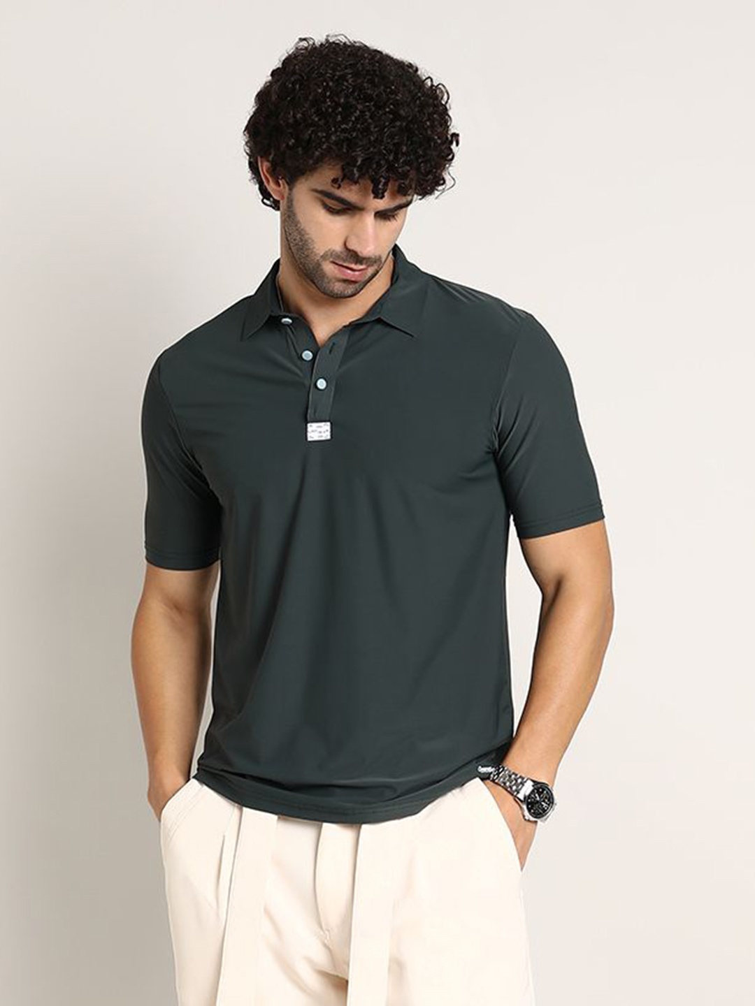 

Campus Sutra Men Solid Polo Collar T-shirt, Charcoal