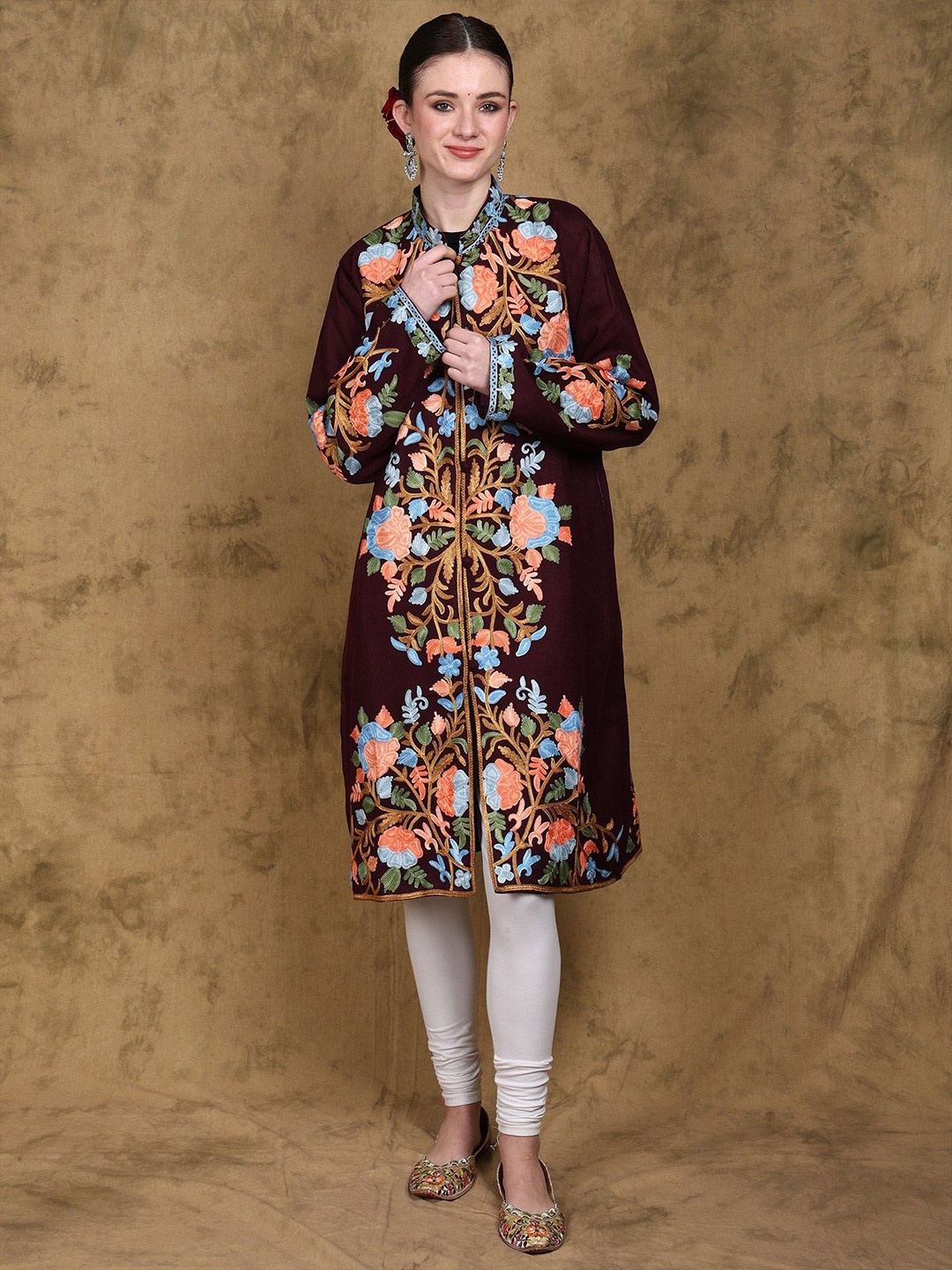 

Exotic India Wool Long Kashmiri Jacket with Multicolor Aari Embroidered Floral Motifs, Purple